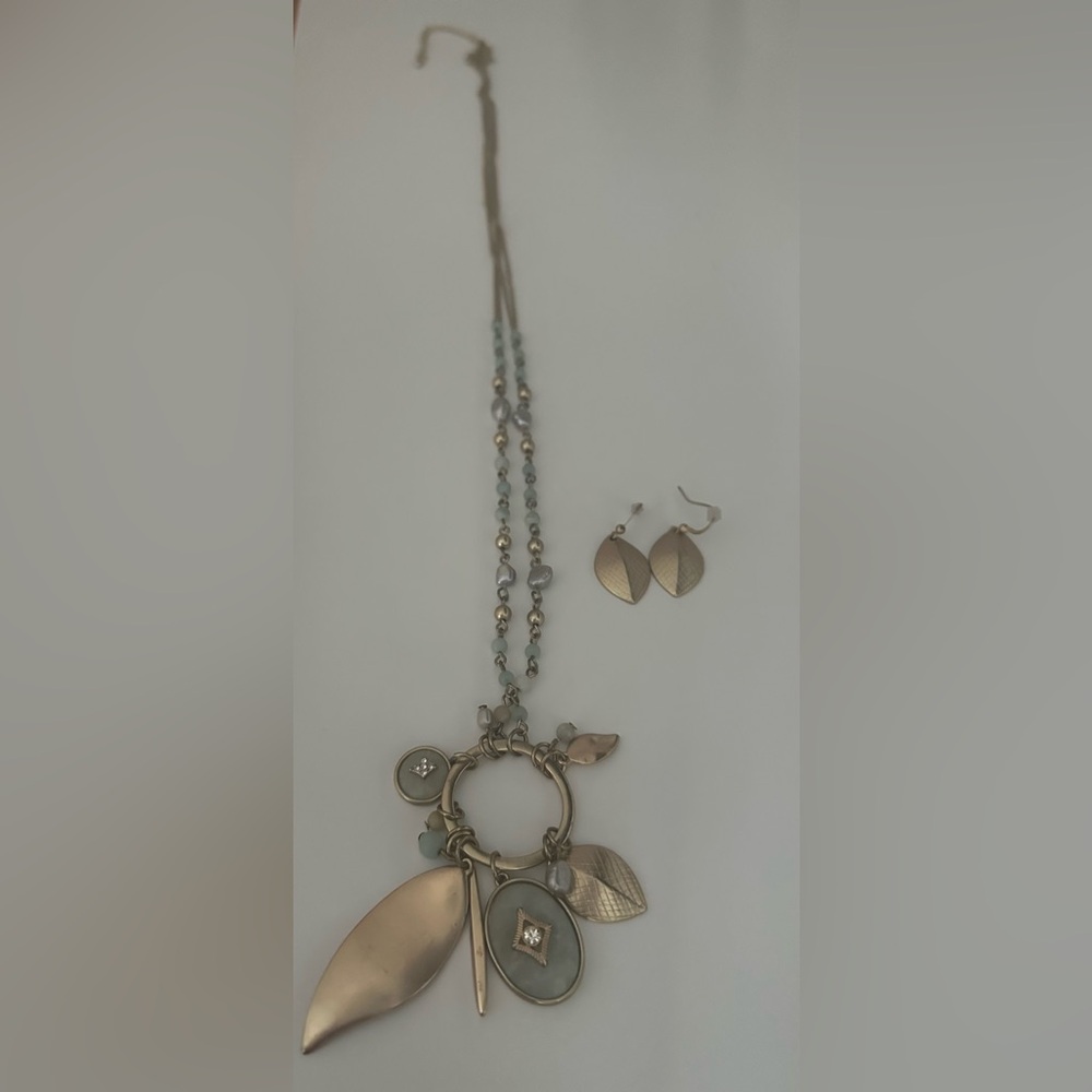 Elegant Gold and Silver Leaf Pendant Necklace and Earring Set